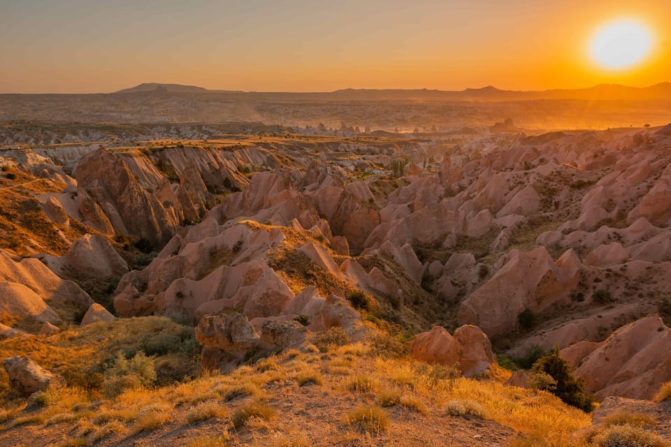 Cappadocia Watching the Sunset With Wine in Red Valley - Key things to know