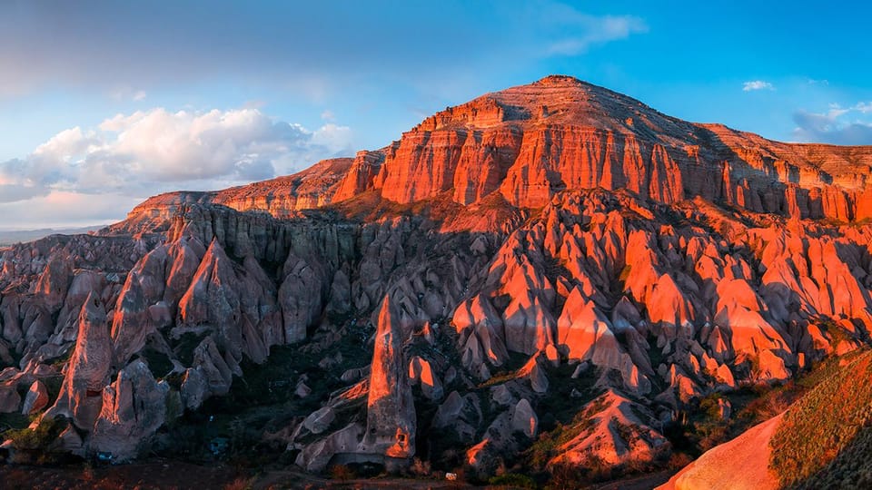 Cappadocia Watching the Sunset With Wine in Red Valley - Guide Style and Photo Help: What You Can Expect