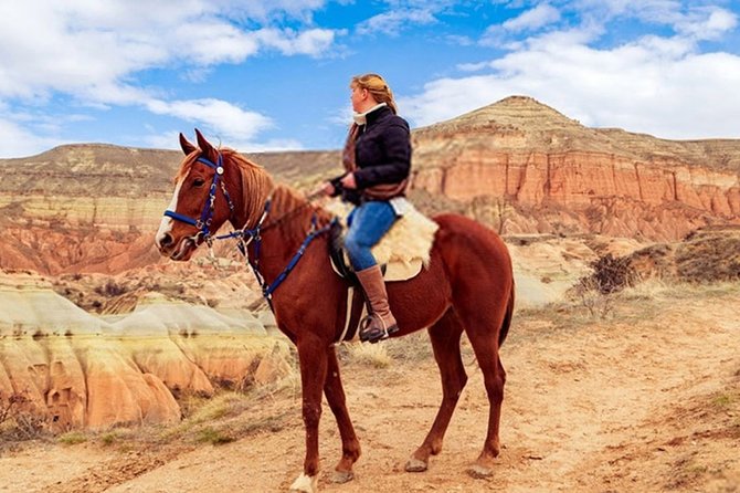 Horse Riding in Cappadocia in fairy chimeys - Red Valley Top Photos and the Cross Church Cafe Rest Break
