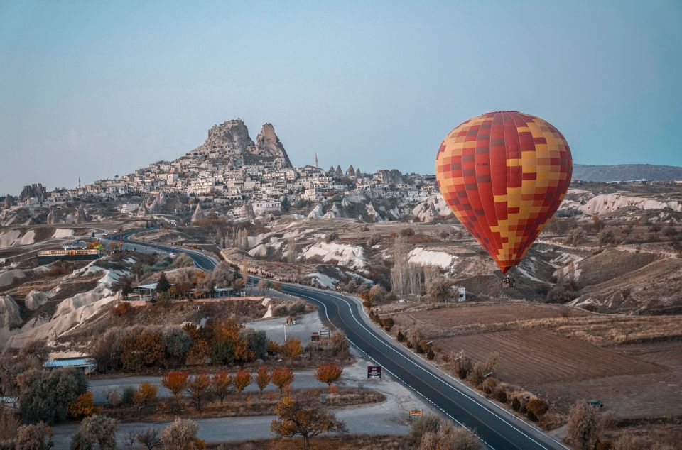 Hot air balloons in Goreme red valley - Hotel pickup and the small-group advantage (English guide included)