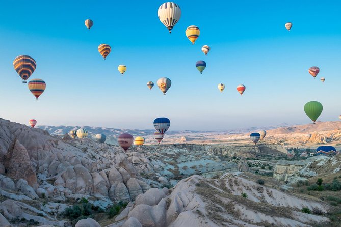 Turkey Hot Air Balloon Tour in Cappadocia - Snacks and a warm cup while pilots choose the takeoff site